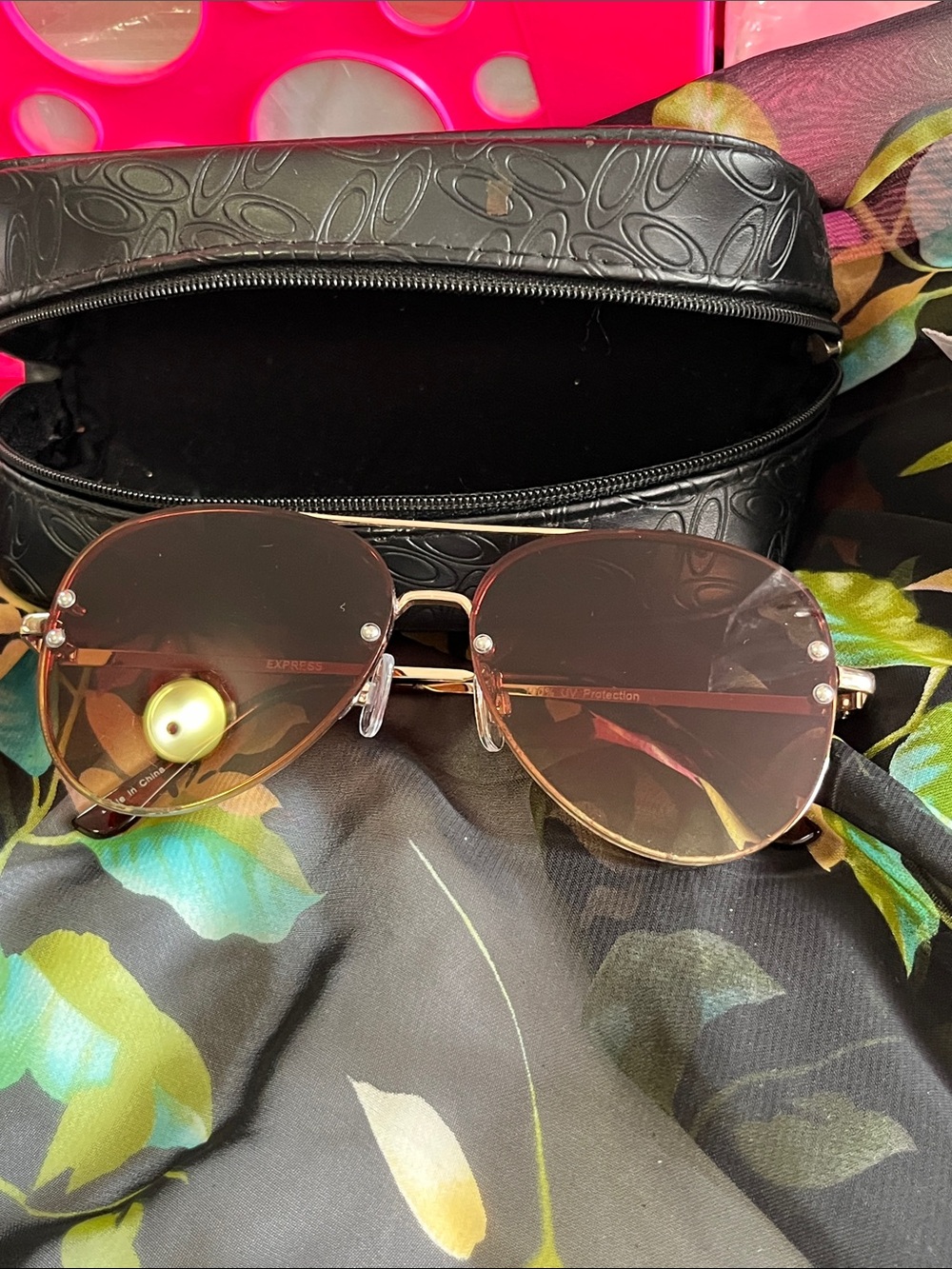 Express Rose Gold Rimless Sunglasses with Brown Lenses